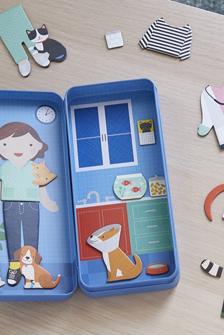 Portable magnetic dress-up activity set for kids with vet theme