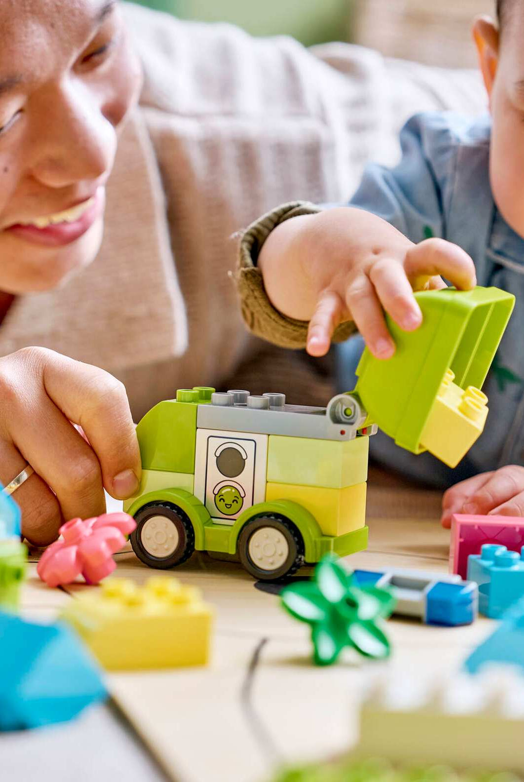Toddler playing with LEGO DUPLO Creative Vehicles 10474 set