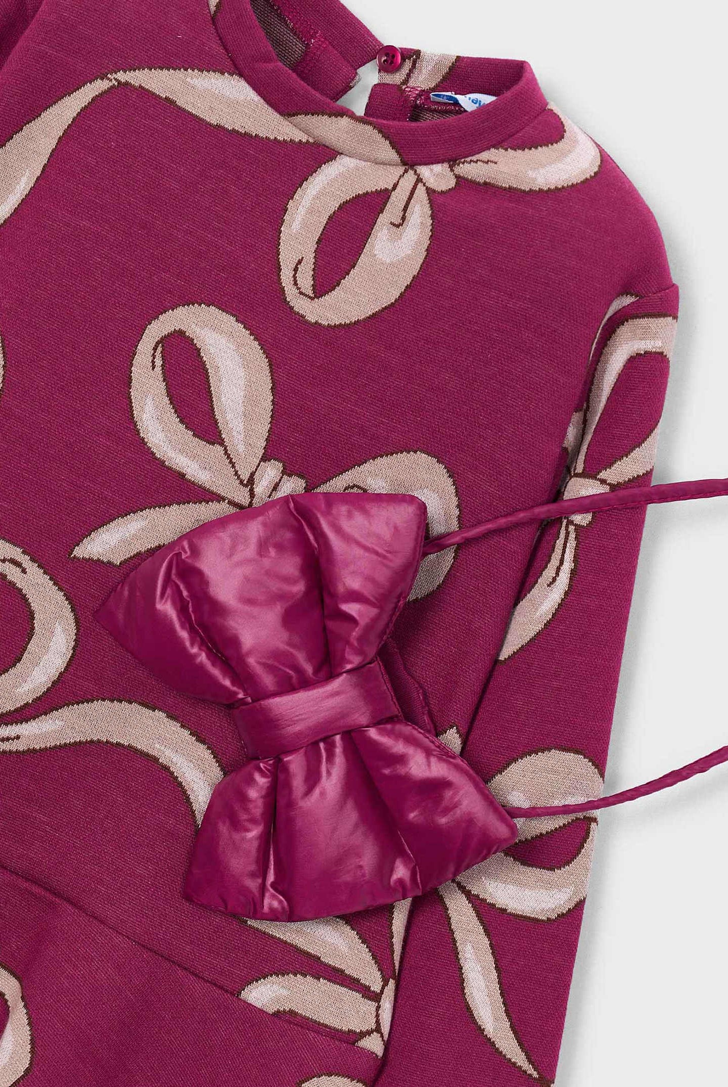 Closeup Detail of Bow dress and bag for girls
