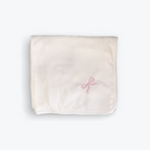 White Pima cotton blanket with pink bow 
