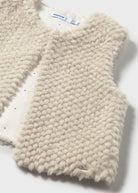 Mayoral girls faux fur vest in sand - detail view of luxurious polyester fur texture and premium finish / Cute as Buttons