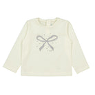 Toddler girl cream long sleeve bow shirt with silver accents