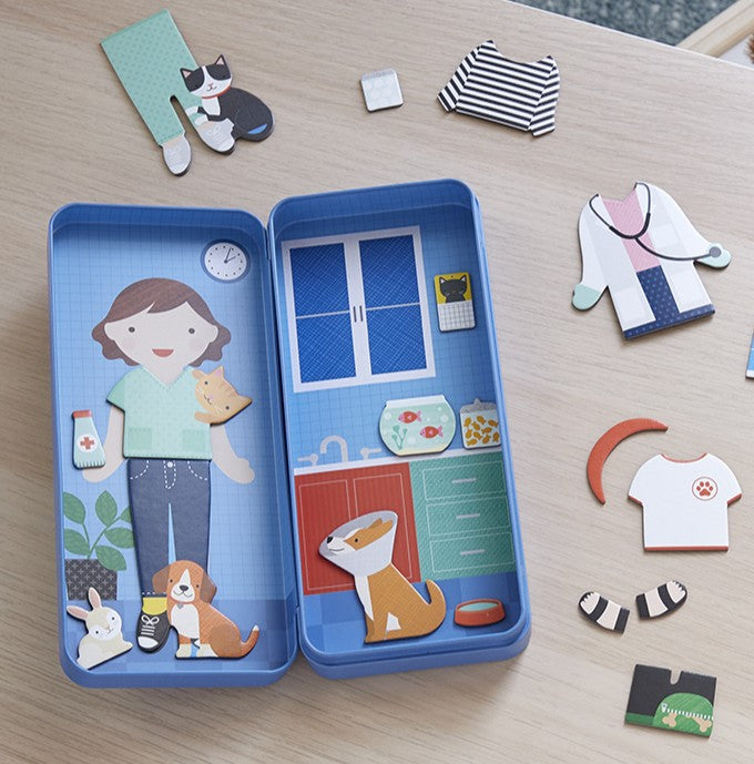 Portable magnetic dress-up activity set for kids with vet theme