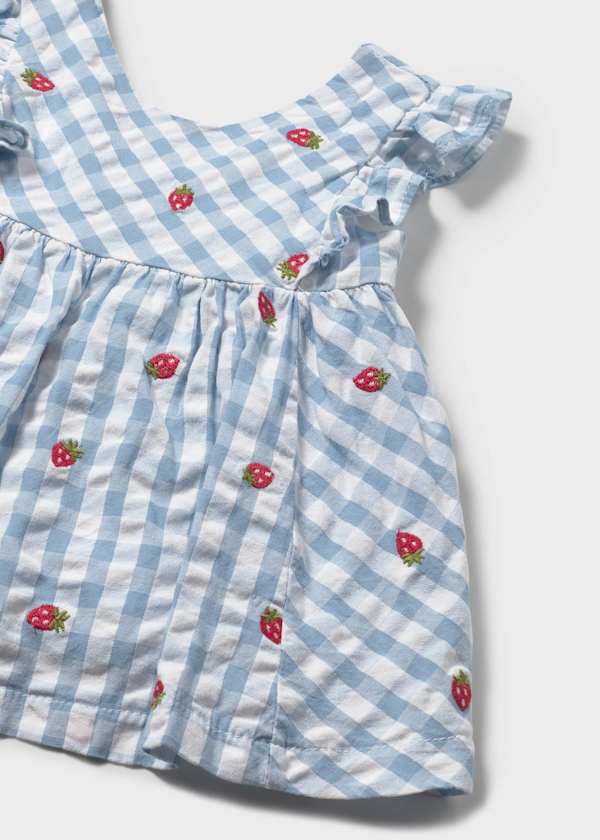closeup detail of Strawberries in Mayoral Dress