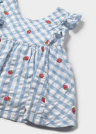 closeup detail of Strawberries in Mayoral Dress
