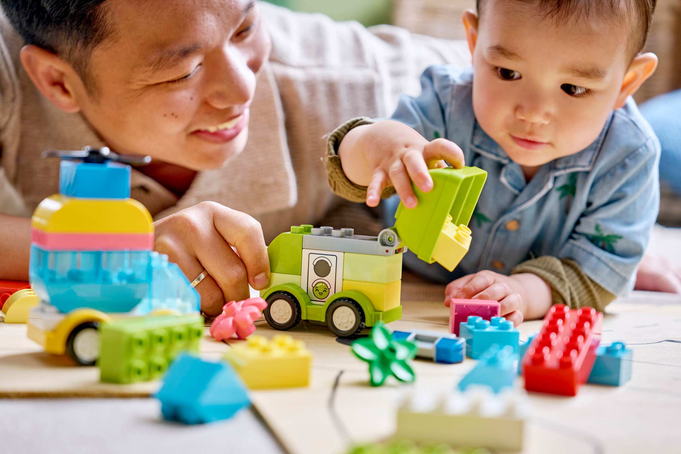 Toddler playing with LEGO DUPLO Creative Vehicles 10474 set