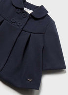 close up of girl dress coat